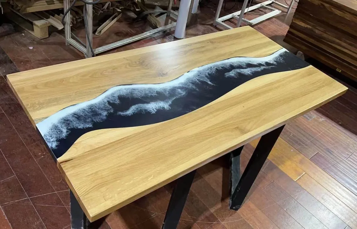 Table à manger rivière Bévéra, résine noire — ATELIER RIVIÈRE, fabrication à la commande