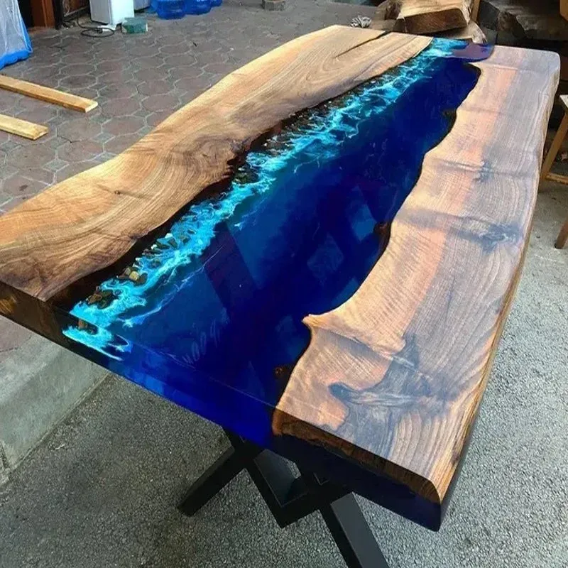 Table à manger rivière Guiers, résine bleue — ATELIER RIVIÈRE, fabrication à la commande