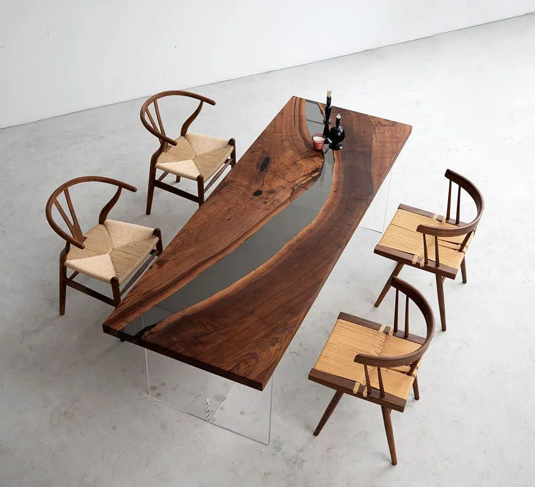 Table à manger rivière Seille teinte noyer, résine noire — ATELIER RIVIÈRE, fabrication à la commande