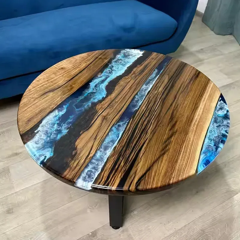 Table basse rivière ronde Midouze, résine bleue — ATELIER RIVIÈRE, fabrication à la commande